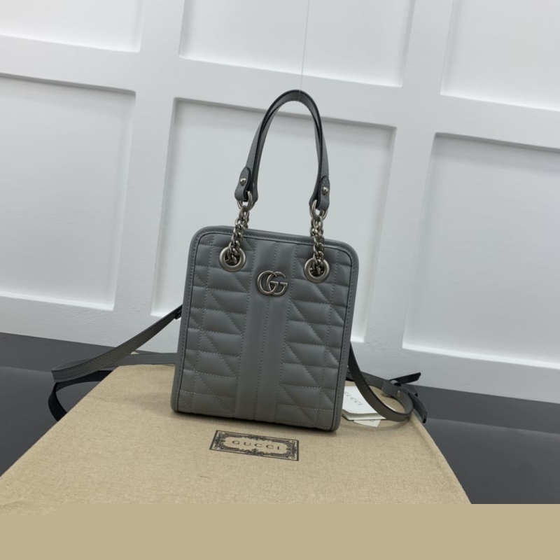 G*u*i top handle bags
